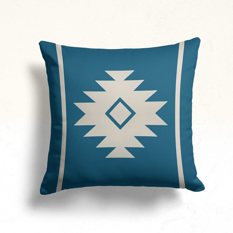 Teal cushion cover with a cream stepped diamond and two narrow side stripes.