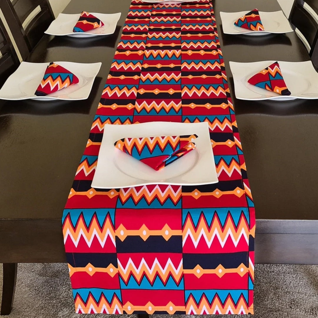 Bright red, blue and yellow geometric table runner with matching placemats.