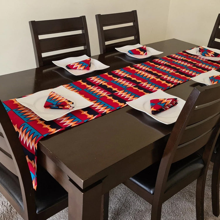 Bright red, blue and yellow geometric table runner with matching placemats.