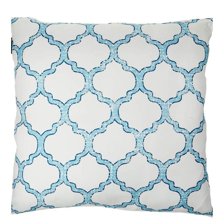 White cushion cover with a light blue quatrefoil lattice pattern.