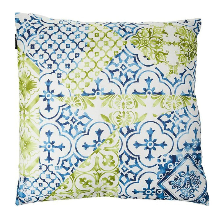 Cushion cover with blue, green and white tile-like patchwork patterns.