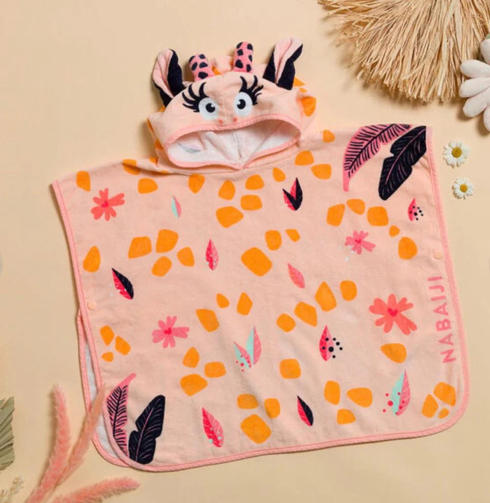 Peach giraffe-pattern hooded towel poncho laid flat.