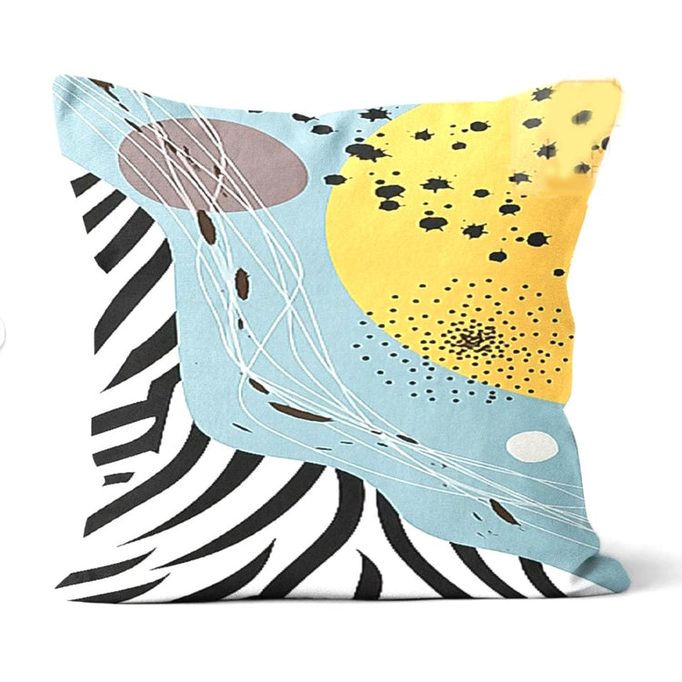 Cushion cover with pale blue, yellow and black striped abstract shapes.