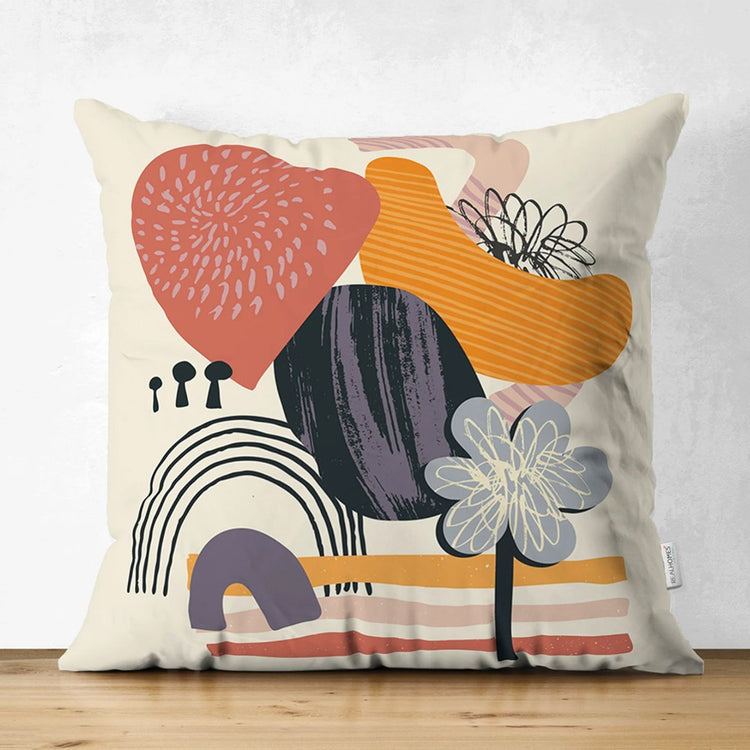 Cream cushion cover with abstract hearts, flowers and rainbows in warm colours.