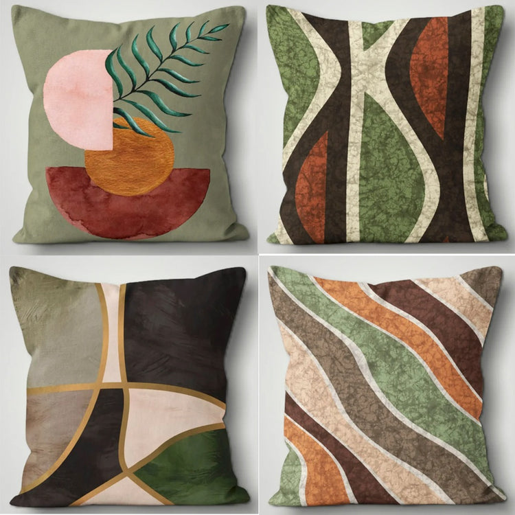 Four cushion covers with green, rust, brown and cream abstract designs.