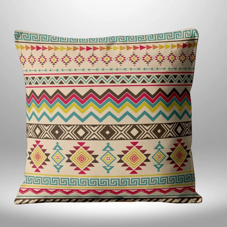 Cream cushion cover with colorful horizontal bands of chevrons, diamonds and geometric motifs.