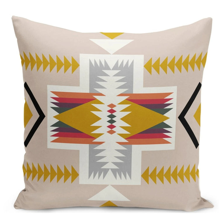 Beige cushion cover with a white geometric cross and mustard, rust and grey details.