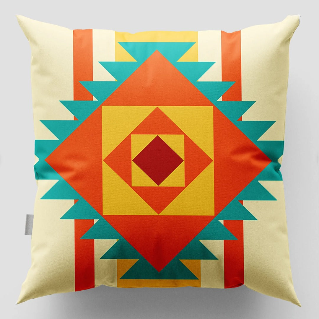 Cream cushion cover with a large orange, yellow, red and turquoise stepped diamond.