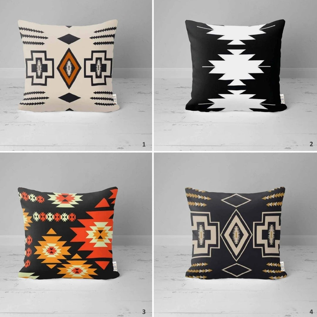 Four black and cream cushion covers with rust and orange geometric accents.