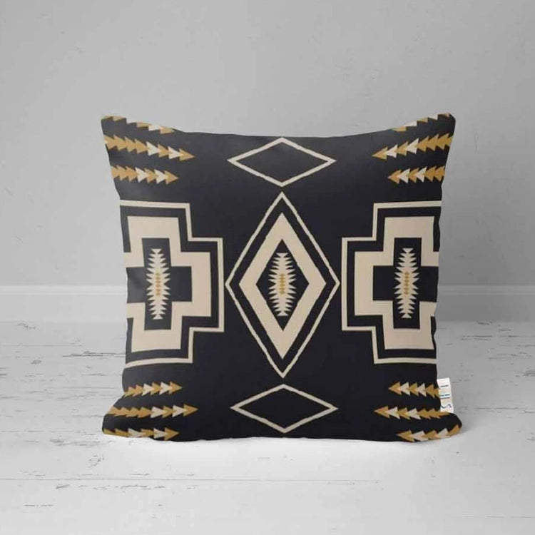 Charcoal cushion cover with cream outlined geometric motifs and small mustard accents.