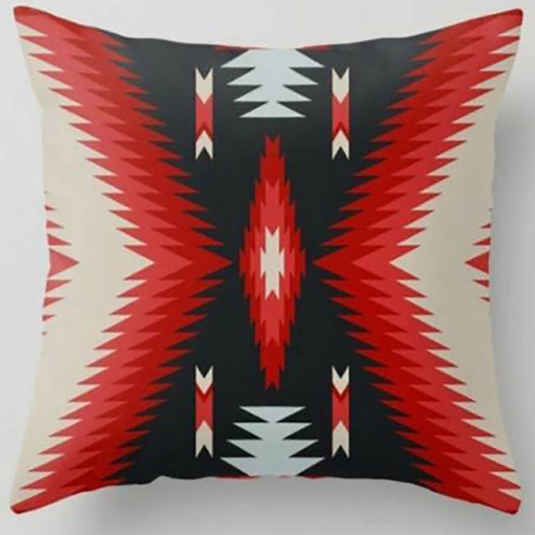 Cushion cover with large red, black and cream stepped triangular bands.