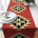 Terracotta table runner with large cream and black geometric star motifs.