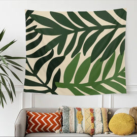 Cream tapestry with large dark green tropical leaves.