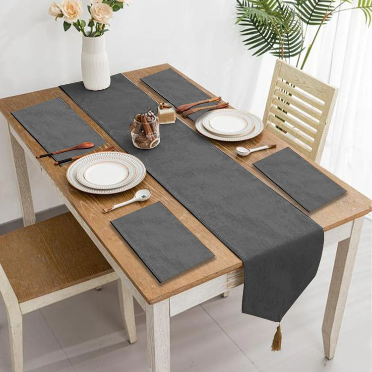 Grey velvet table runner with matching grey placemats.