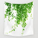 White tapestry printed with trailing green foliage.