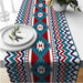 Turquoise, red and cream geometric table runner.
