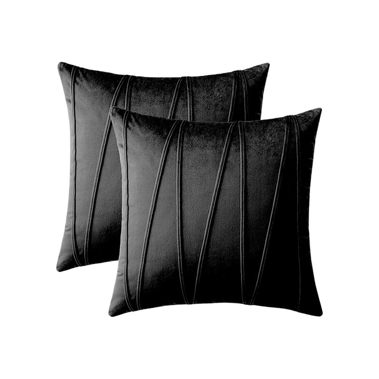 Two black cushion covers with long angular stitched lines.