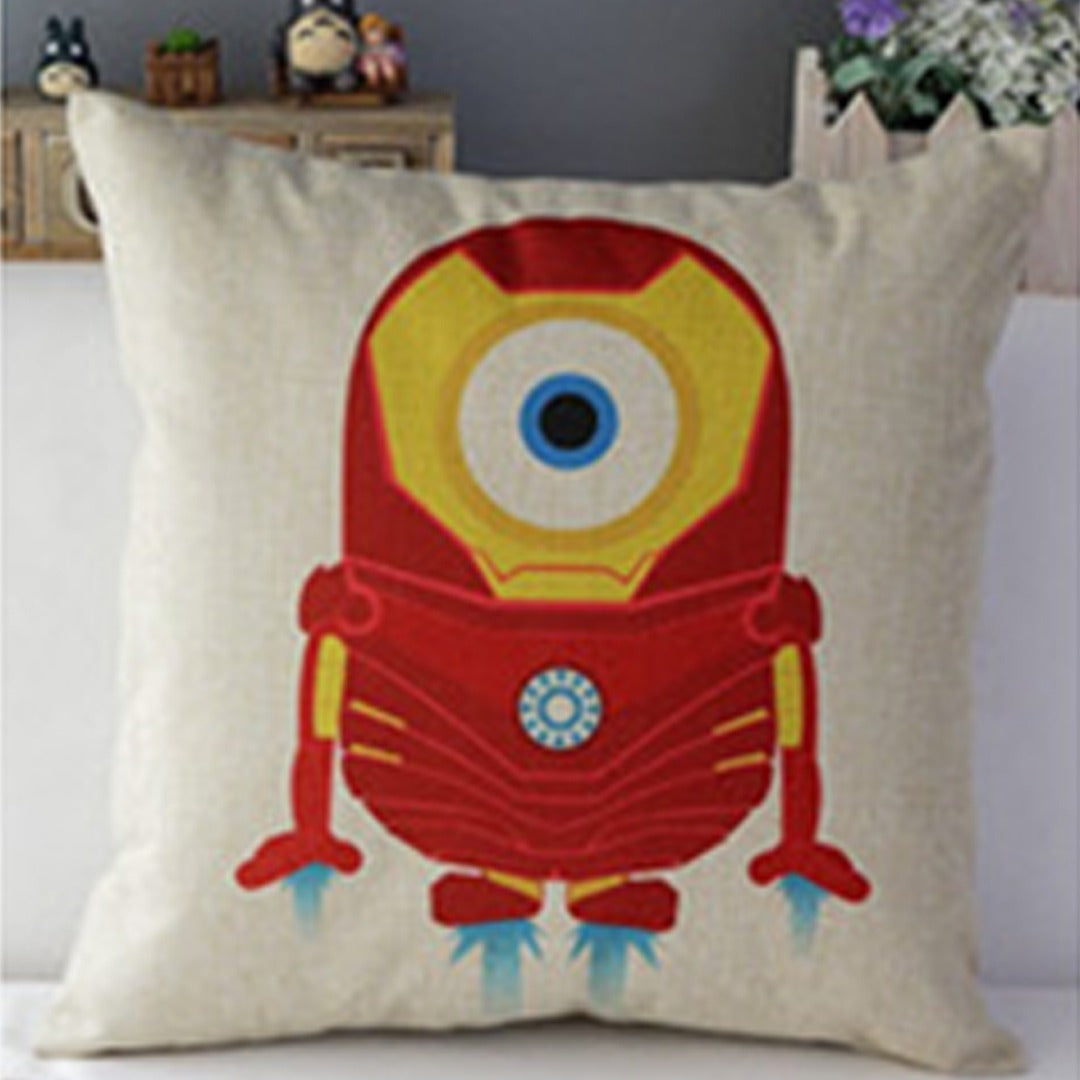 Cream cushion cover with a one-eyed cartoon character in a red and gold armoured suit.