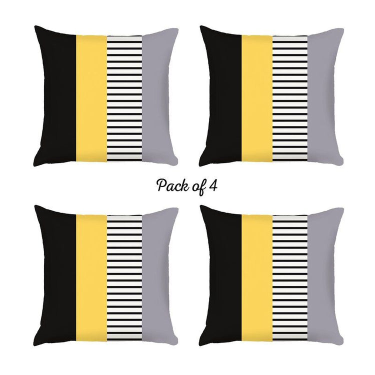 Four cushion covers with black, yellow and grey panels and fine black and white stripes.