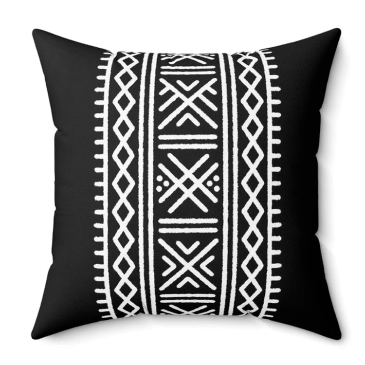Black cushion cover with a wide vertical band of white geometric motifs.