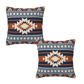 Two square cushion covers with navy, rust and cream geometric bands and central diamonds.