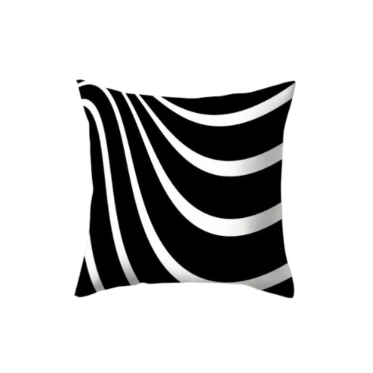 Black cushion cover with white curves sweeping from one corner.