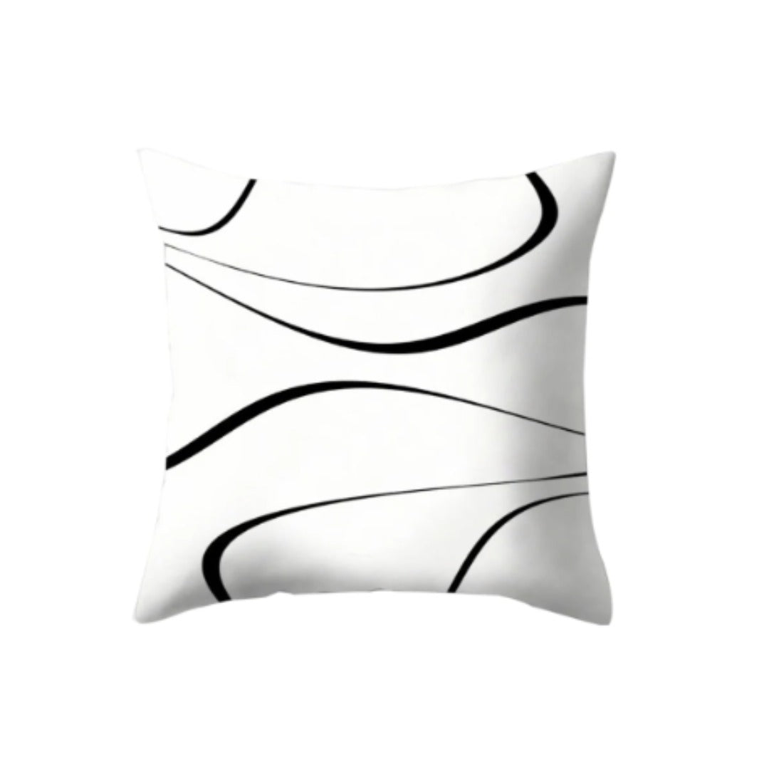 White cushion cover with thin sweeping black curves.