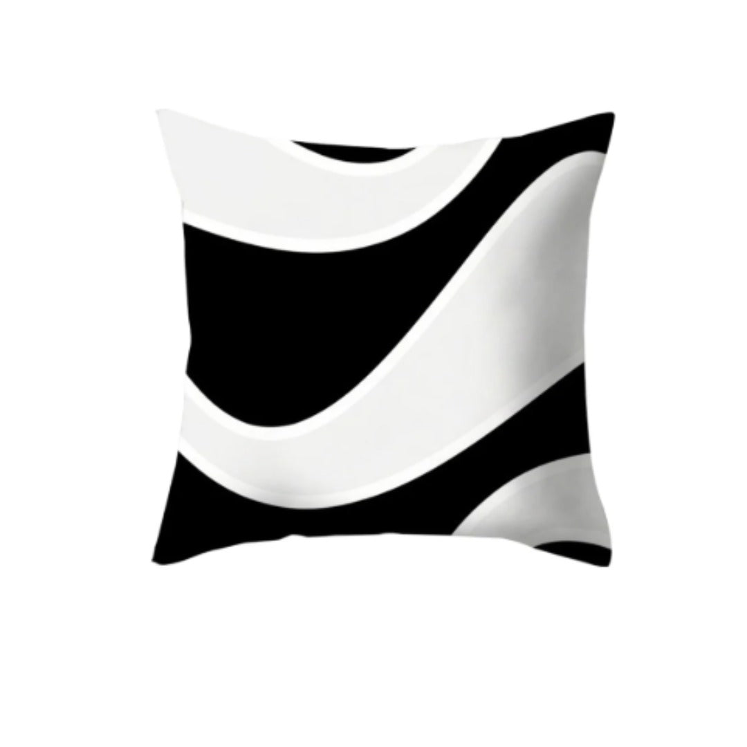 Cushion cover with broad flowing black and white shapes.