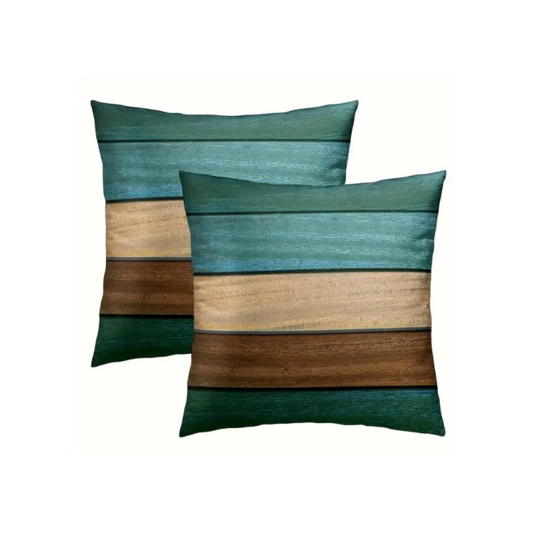 Two cushion covers with textured teal, cream and brown horizontal bands.