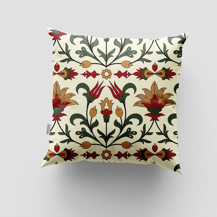 Cream cushion cover with horizontal arrangements of red flowers and green stems.