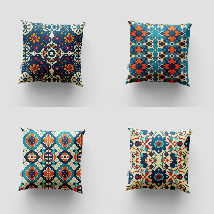 Four cushion covers with colourful ornate floral and geometric tile patterns.