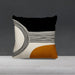 Black and cream cushion cover with fine curved lines and an ochre lower corner.