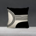 Black and cream cushion cover with fine curved lines and a black lower corner.