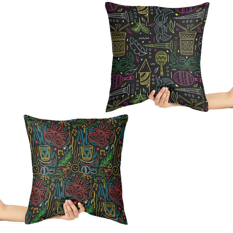 Two dark cushion covers with colourful line-drawn festival motifs.