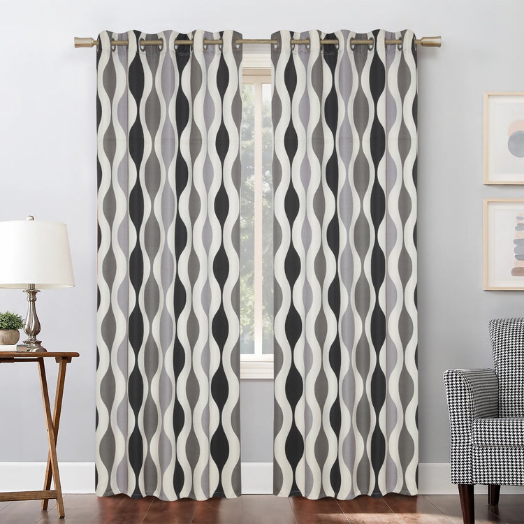 Black, grey and cream wavy-pattern curtains hanging at a window.