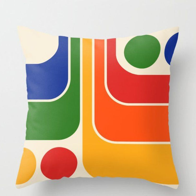 Cream cushion cover with curved blue, green, orange and red geometric panels.