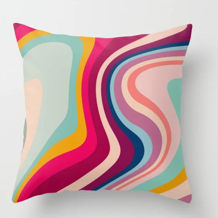 Cushion cover with flowing pink, blue, yellow and cream wavy stripes.