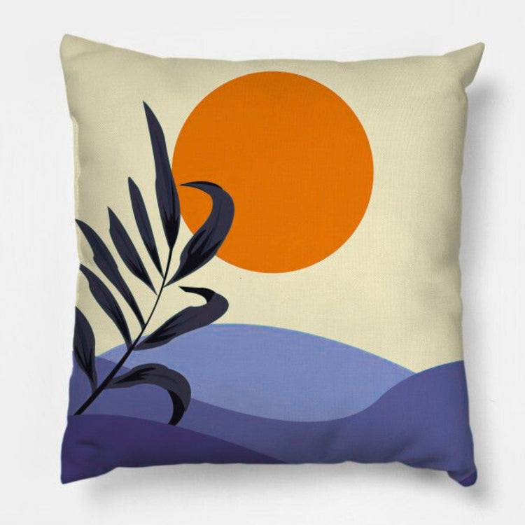 Cream cushion cover with a black leafy sprig, an orange sun and layered purple hills.