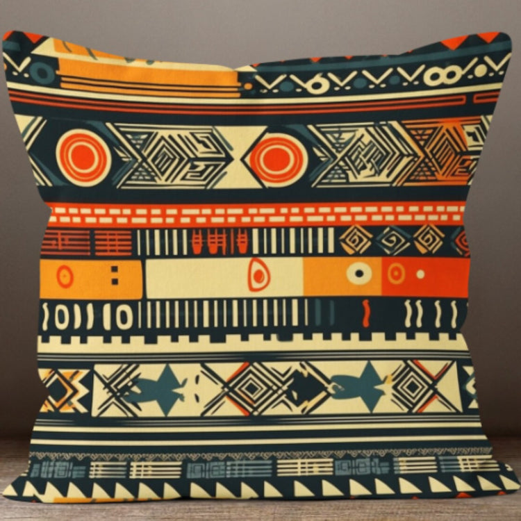 Cushion cover with narrow orange, green, cream and black geometric bands.