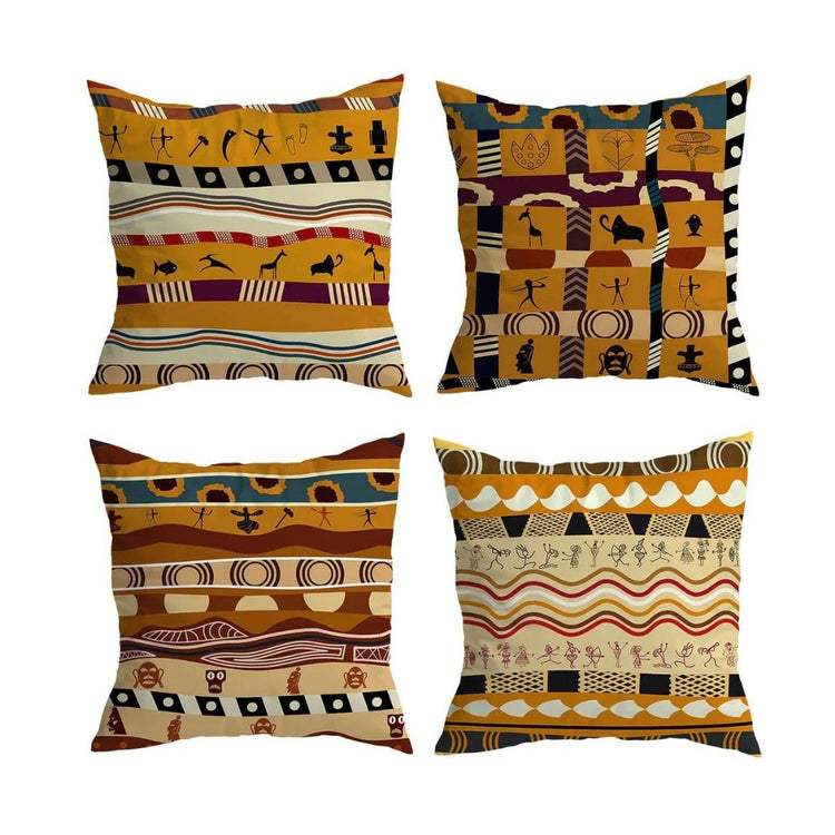 Four cushion covers with ochre, rust, cream and black geometric and symbolic patterns.