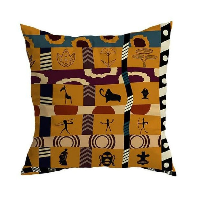 Cushion cover with an ochre, cream, rust and black patchwork of geometric and symbolic shapes.