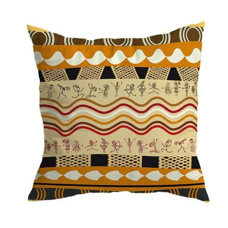 Cream cushion cover with ochre and rust wavy stripes and small line-drawn motifs.