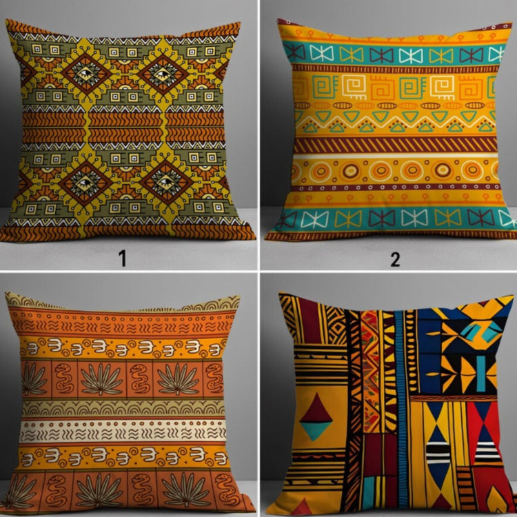 Four cushion covers with intricate earthy and colourful geometric band patterns.