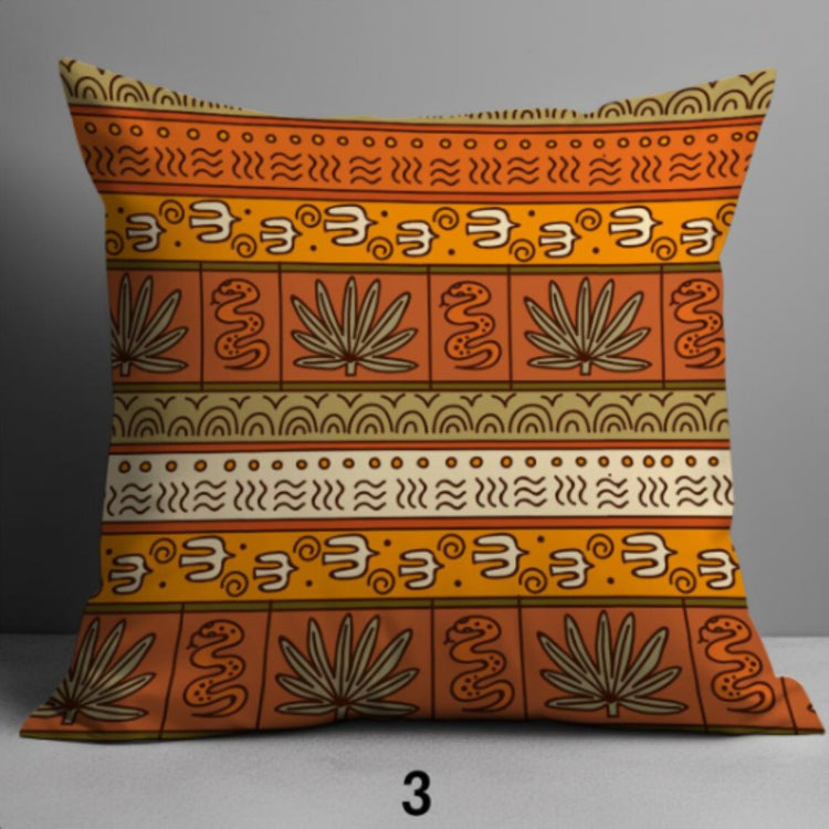 Rust cushion cover with narrow ochre and cream bands of small geometric and leaf motifs.