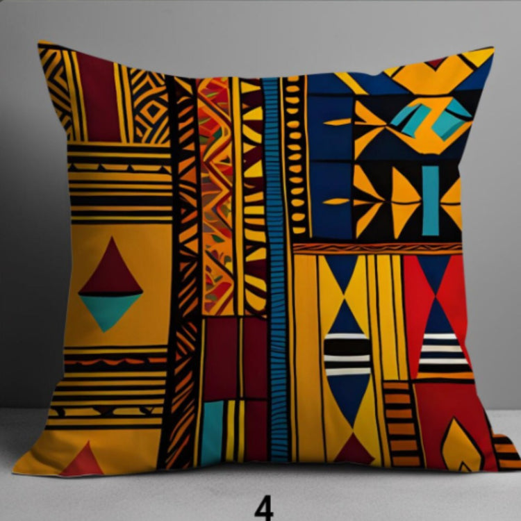 Cushion cover with vivid yellow, blue, red and black patchwork geometric panels.