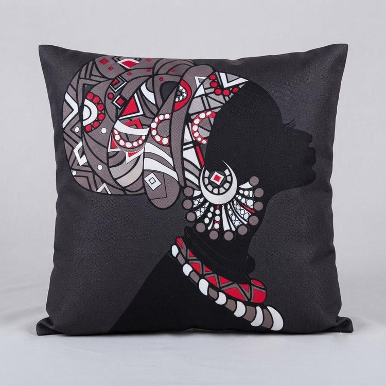 Grey cushion cover with a woman's profile, patterned headwrap and red jewellery details.