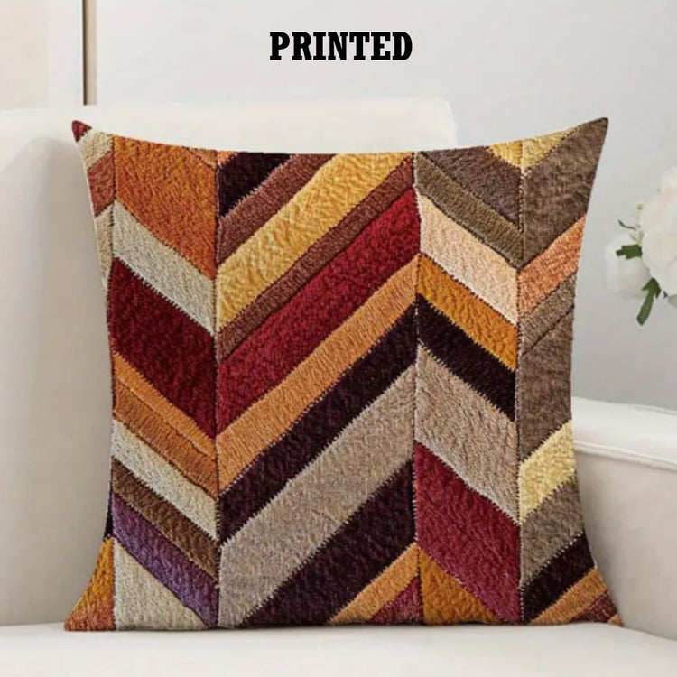 Cushion cover with wide rust, mustard, brown and cream chevron bands.