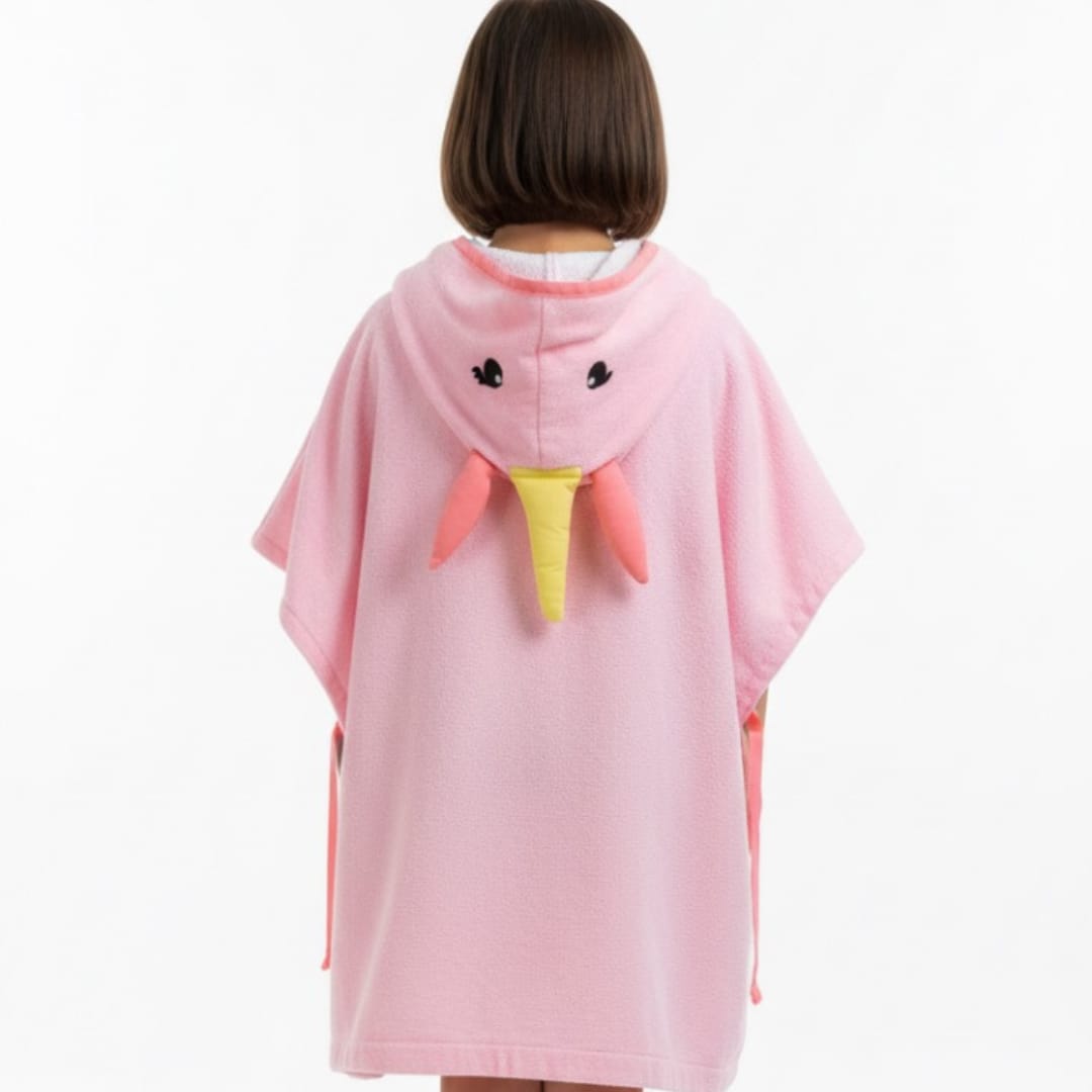 Back view of a pink unicorn-themed towel poncho with a hood and tail detail.