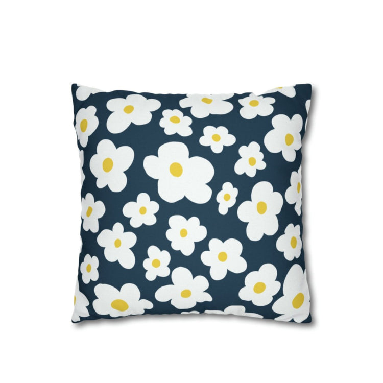 Navy cushion cover with rounded white and pale blue flowers and yellow centres.