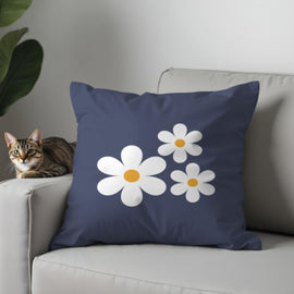 Navy cushion cover with a cluster of white daisies and yellow centres.